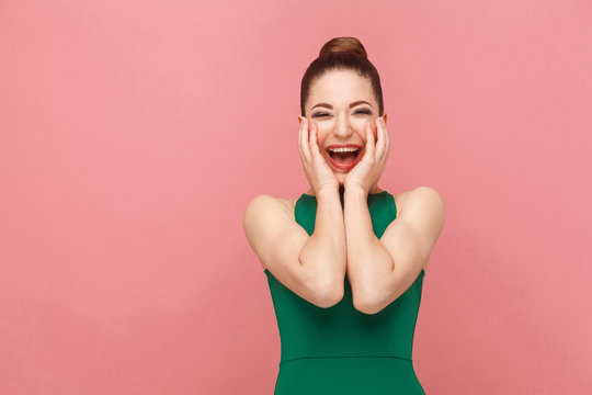Perfect woman wearing green dress toothy smiling