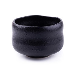 Ceramic black cup isolated on a white background