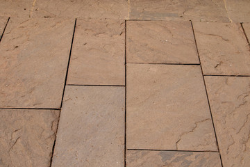 Surface of a tiled way on the ground