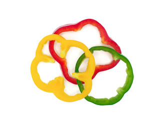 Fresh vegetables, red, yellow, green sweet peppers on white background.