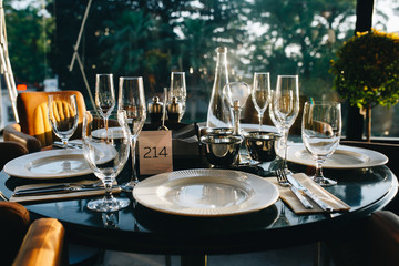 table setting in a luxurious restaurant before a gastronomic dinner.