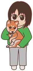 立って犬を抱く女性　柴犬