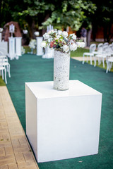 wedding bouquet from different colors on a curbstone for an interior