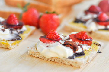 whole wheat bread and canape with strawberry