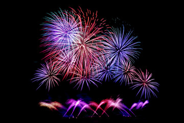 Beautiful colorful isolated firework display for celebration happy new year and merry christmas on black background