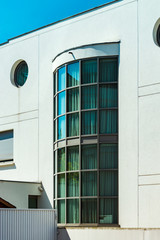 Fototapeta na wymiar Windows and balcony, modern apartment house