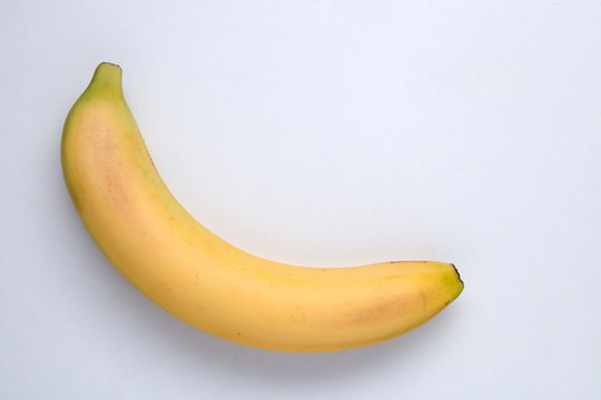 Natural looking banana on white background. Fruit