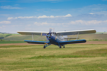 Fototapeta na wymiar small airplane ready to take off on the airfield