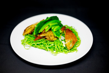 Roasted duck with jade noodle in white dish