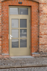 wooden door with bars