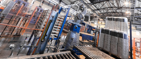 Fiberglass production industry equipment at manufacture background