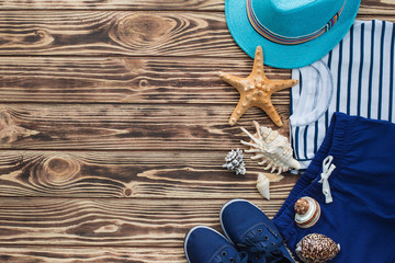 Flat lay picture of child`s summer clothes