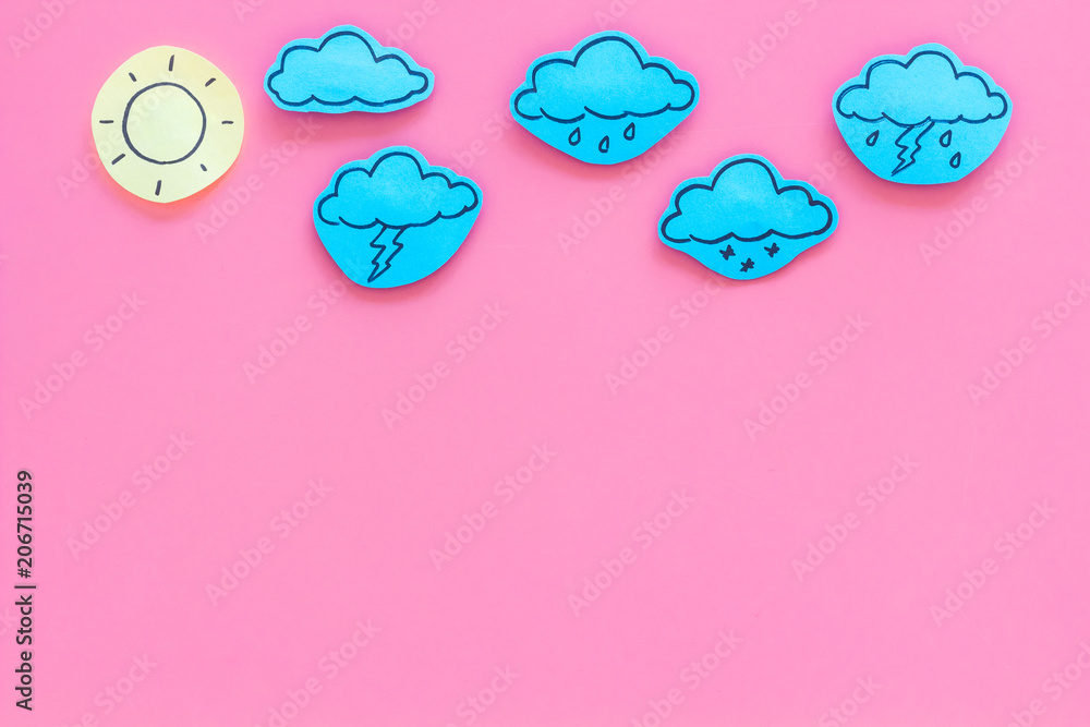 Wall mural weather forecast concept. modern weather icons set on pink background top view copy space
