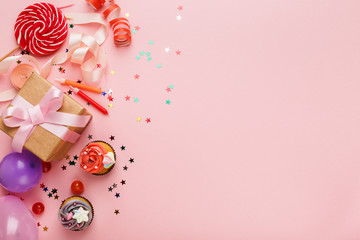 Obraz na płótnie Canvas Birthday party background with gift and cakes