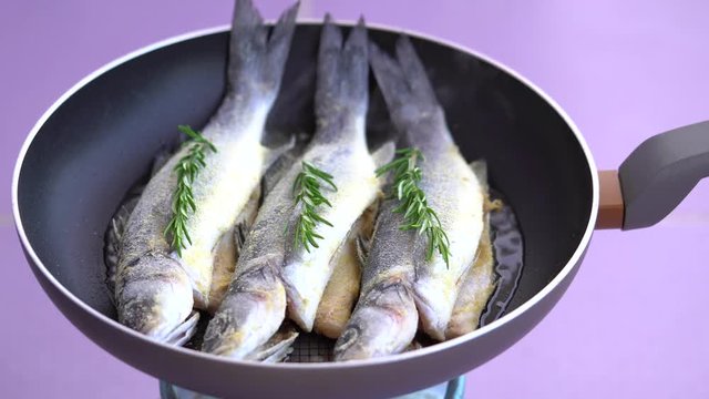 Fish Is Being Fried On The Frying Pan