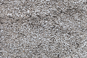 texture of wall made of stones on concrete