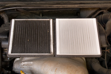New and old car air filter. Close up.