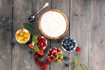 Yogurt and berry. Fresh fruit yogurt with fresh berries and peaches