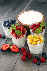 Yogurt and berry. Fresh fruit yogurt with fresh berries and peaches