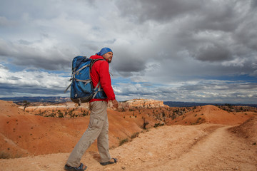 Hiker visits Bryce canyon National park in Utah, USA