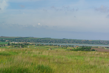 Fototapeta premium Views over the estuary and the village of Starotitarovskaya the Temryuk district of Krasnodar region