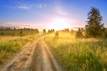 Fototapeta na wymiar landscape with sunrise and road