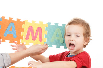 Alphabet puzzle pieces on white background