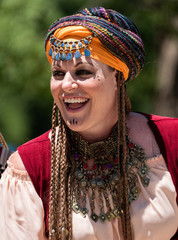 Happy Smiling Belly Dancer at Pirate Festival with Turban