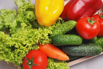 Fresh Summer Vegetables in Wooden Box Isolated on Textured Gray Backgroung. Organic Vegetables Vegetarian Vegan Health food Eatting