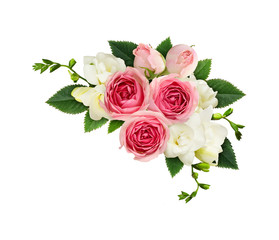 Freesia and pink rose flowers in a corner arrangement