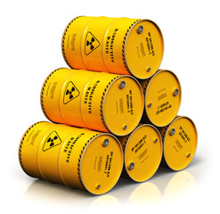 Group of stacked yellow drums with radioactive waste isolated on white