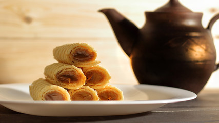 pipes with peanut butter, old teapot made of red China