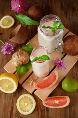 Coconut cocktail decorated with mint in glass jars. Top view