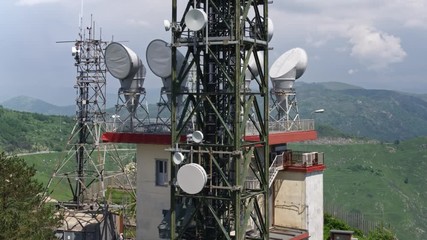 aerial view of telecom antennas telecommunications towers on mountaintop