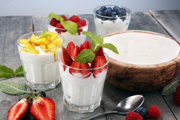 Yogurt and berry. Fresh fruit yogurt with fresh berries and peaches