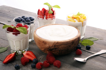 Yogurt and berry. Fresh fruit yogurt with fresh berries and peaches
