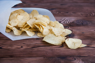 Unhealthy appetizing salted potato chips