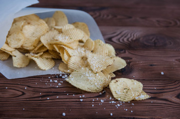 Unhealthy appetizing salted potato chips
