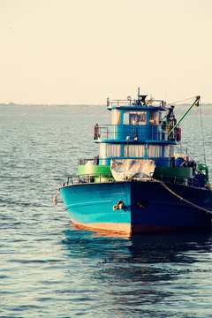 Large fish processing boat in the deep water dock. photo