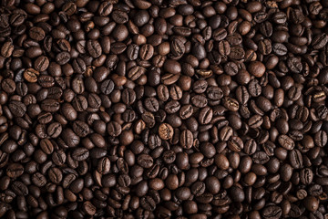 From above coffee beans textured background