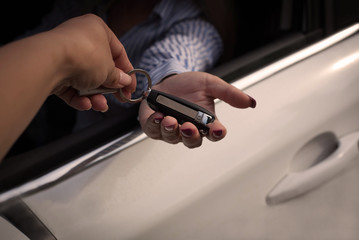 Woman buying a car.