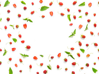 Creative frame flat layout of strawberries and mint isolated on white background. Top view. 
