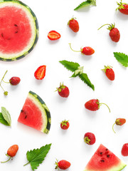 Creative flat layout of strawberries, watermelon and mint isolated on white background. Top view. Concept summer, refreshing drinks.