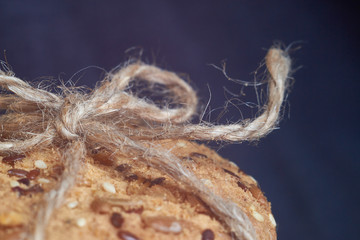 closeup oat large biscuits with sesame, flax and sunflower seeds. Macro