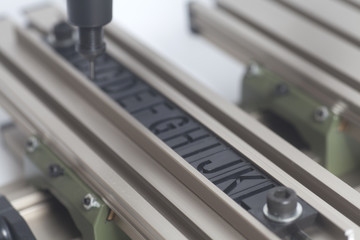 Engraving device pantograph with letterpress alphabet