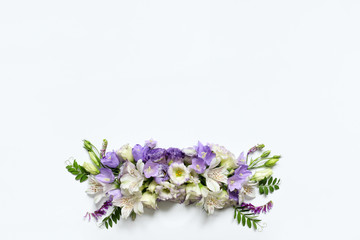 Fototapeta premium Flower arrangement of Alstroemeria, eustoma on a white background.