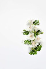 Flower arrangement of peonies, eustoma on a white background.