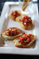 Bread with tomato , bruschetta italian appetizer