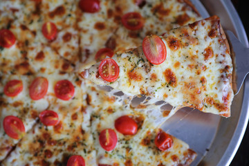 Pizza cherry tomato on wood background