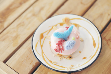 Fancy donut with cute mermaid on top
